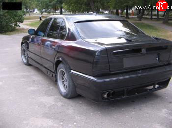 4 999 р. Накладка на задний бампер Rieger BMW 5 серия E34 седан дорестайлинг (1988-1994)  с доставкой в г. Набережные‑Челны