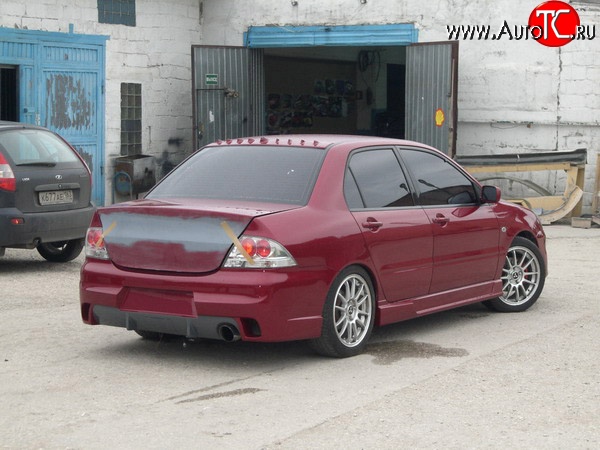 14 299 р. Задний бампер Evo Mitsubishi Lancer 9 1-ый рестайлинг седан (2003-2005) (Неокрашенный)  с доставкой в г. Набережные‑Челны