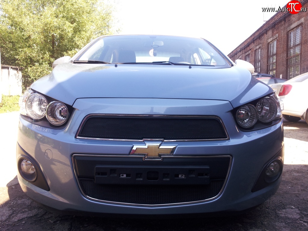 1 469 р. Нижняя сетка на бампер Russtal (черная) Chevrolet Aveo T300 седан (2011-2015)  с доставкой в г. Набережные‑Челны