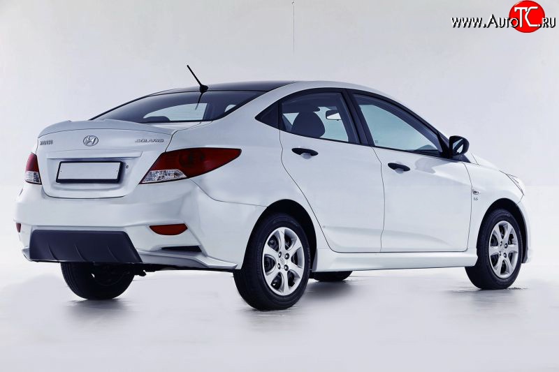 13 499 р. Задний бампер Sport Hyundai Solaris RBr седан дорестайлинг (2010-2014) (Неокрашенный)  с доставкой в г. Набережные‑Челны