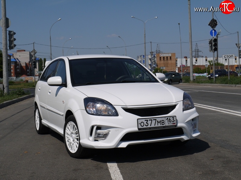 10 999 р. Передний бампер Vita Dm  KIA Rio ( 2 JB,  4 FB) (2005-2024) дорестайлинг седан, дорестайлинг, хэтчбэк 5 дв., рестайлинг, хэтчбэк 5 дв., рестайлинг седан (Без сетки, Неокрашенный)  с доставкой в г. Набережные‑Челны