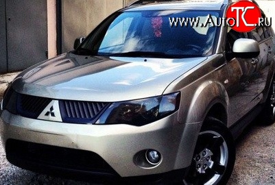 1 529 р. Темная защита передних фар SIM Mitsubishi Outlander XL (CW)  дорестайлинг (2005-2009)  с доставкой в г. Набережные‑Челны