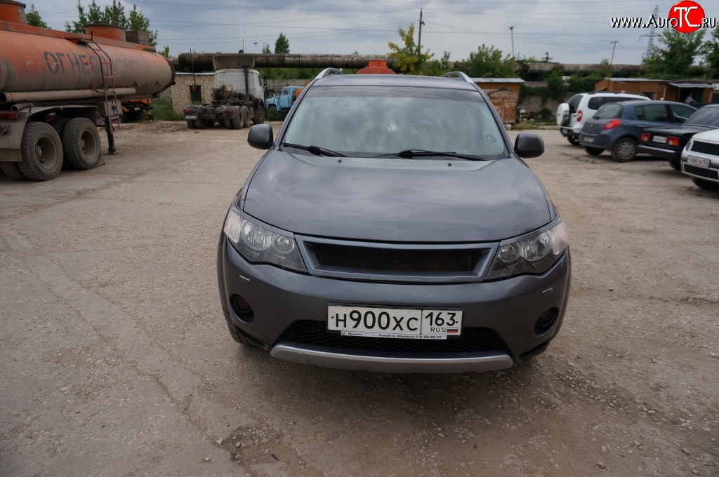 5 449 р. Решётка радиатора (рестайлинг) Sport Mitsubishi Outlander XL (CW)  рестайлинг (2010-2013) (Неокрашенная)  с доставкой в г. Набережные‑Челны