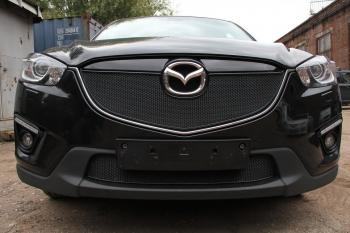 799 р. Зимняя заглушка решетки радиатора (с парктроником) PREMIUM Стрелка11 Mazda CX-5 KE дорестайлинг (2011-2014) (черная)  с доставкой в г. Набережные‑Челны. Увеличить фотографию 2